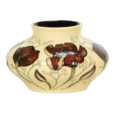 cream colored, short, wide vase with brown flowers, by Moorcroft Pottery