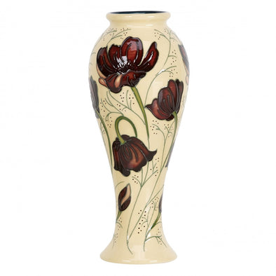 cream colored, tall, narrow vase with brown flowers, by Moorcroft Pottery