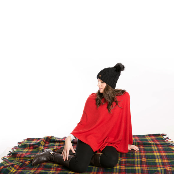 girl sitting on wool tartan plaid blanket, Buchanan modern tartan