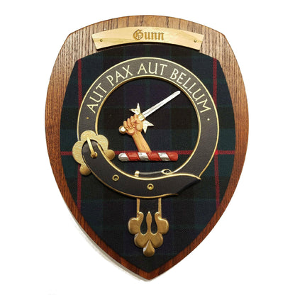 wooden wall plaque with Gunn family crest & tartan